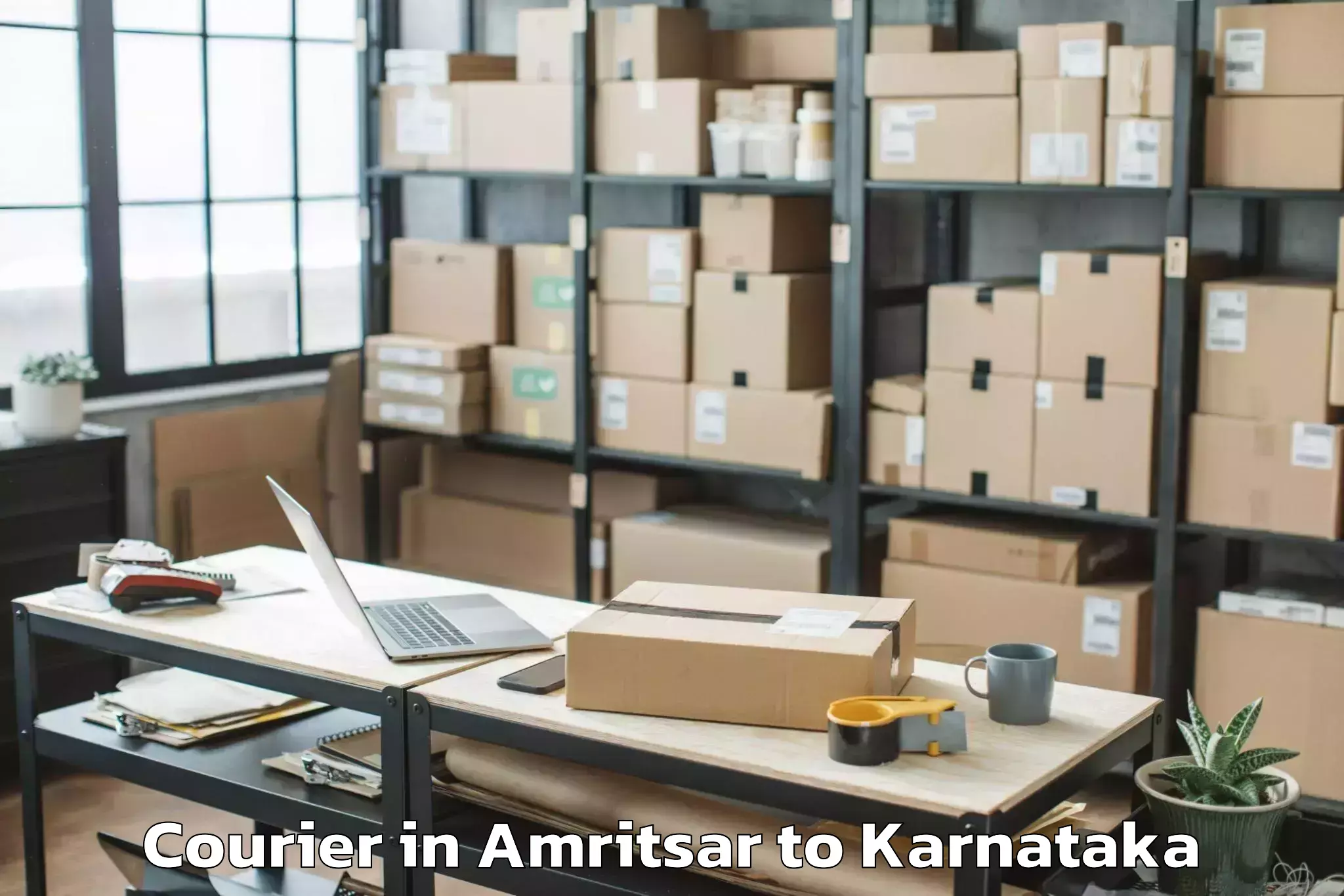 Get Amritsar to Hukeri Courier